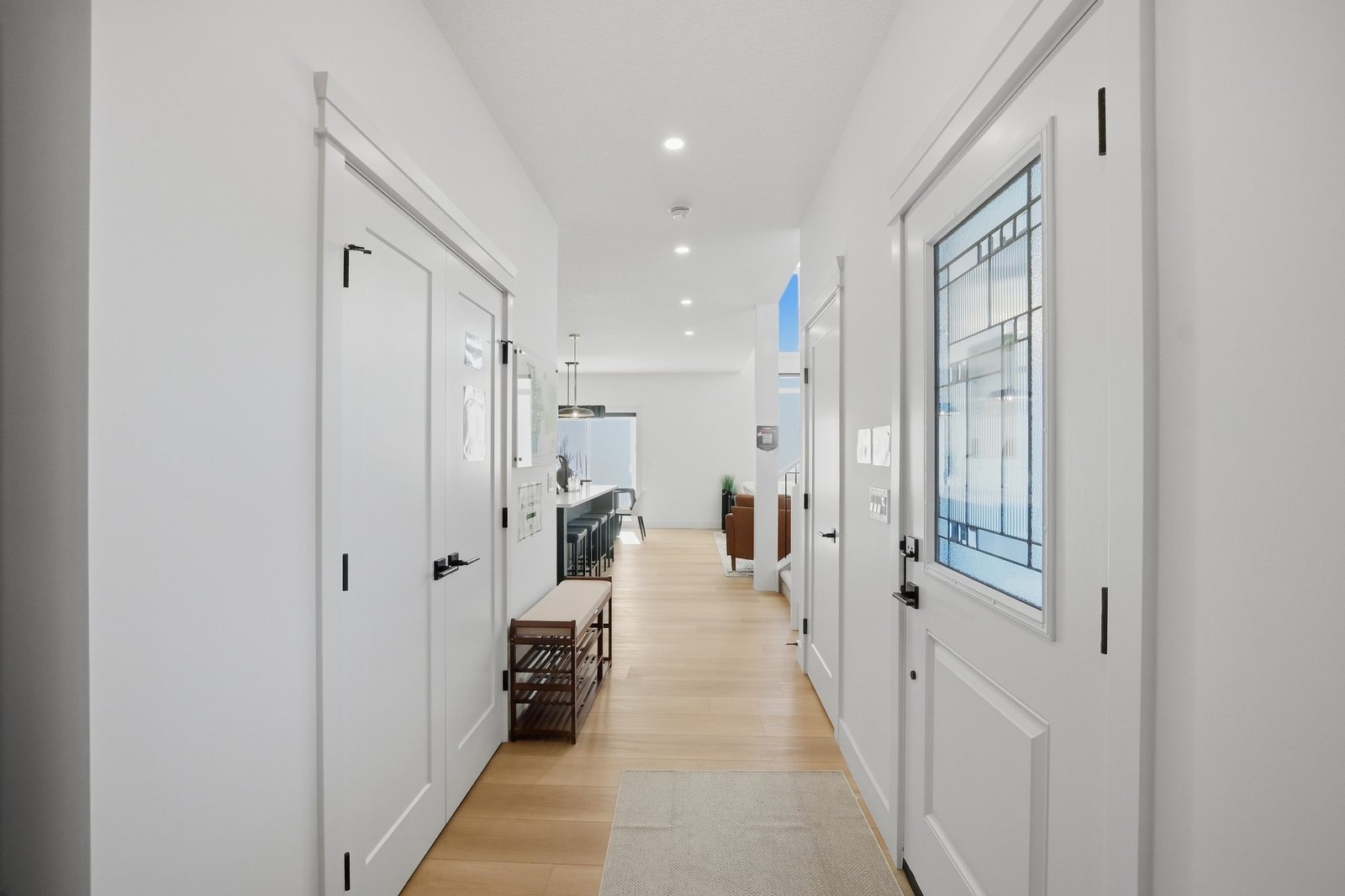 Front entry and main hallway in the Aspen Living showhome, 200 Edgefield Bay