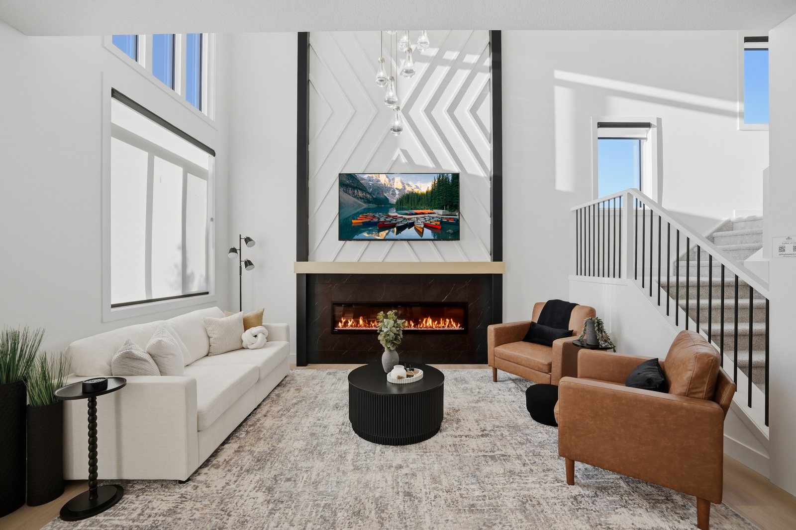 Great room with linear fireplace in the Aspen Living showhome